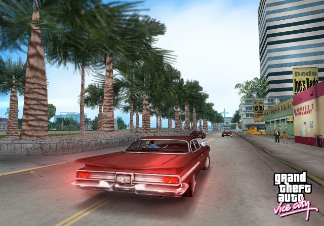 Un automóvil rojo recorre la Vice City del juego clásico