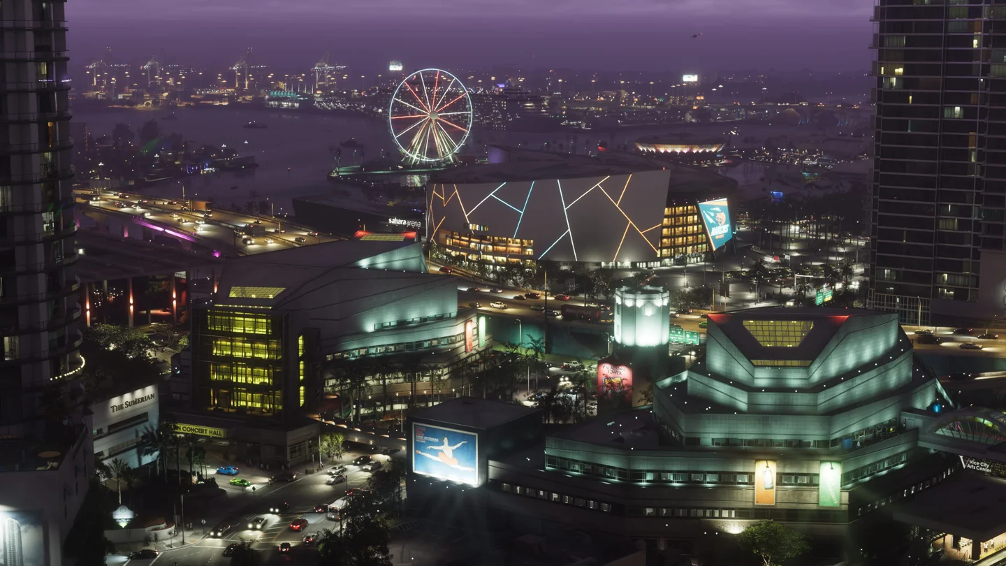Vista nocturna de Vice City con noria y edificios iluminados