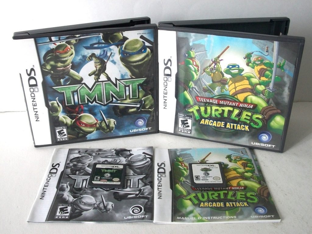 Nintendo DS cases, cartridges, and manuals for TMNT and TMNT: Arcade Attack